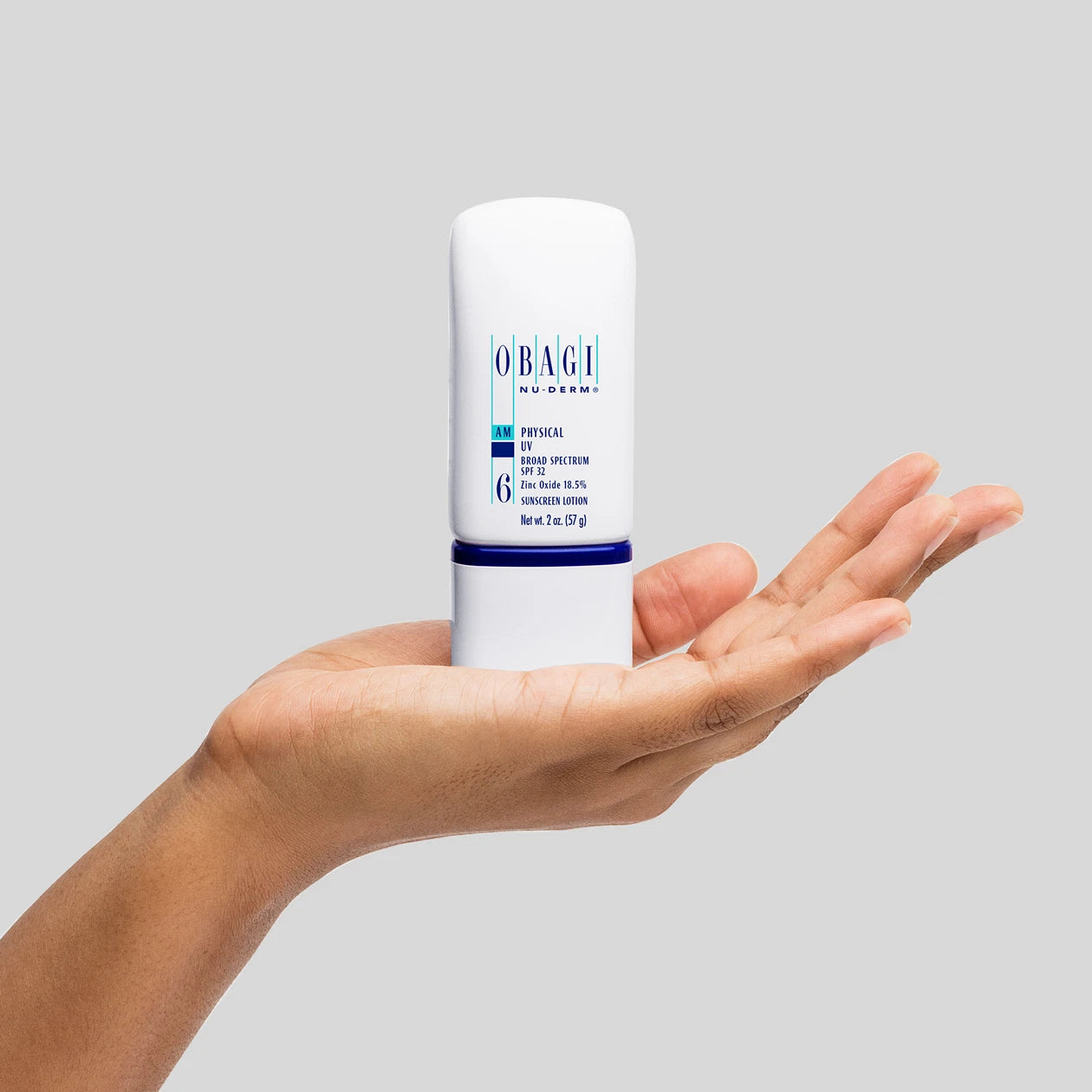 Nu-Derm Physical UV Broad Spectrum SPF 32 With Model Hands